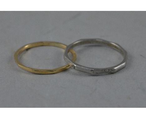 TWO DECAGON SHAPED RINGS, one platinum, ring size P, approximate weight 2.6 grams, one 9ct, ring size R, approximate weight 0