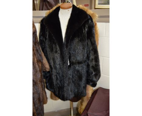 A BLACK FUR JACKET, with label 'Black Excellent Mink', together with a long light brown fur coat (2)