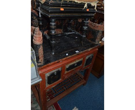 AN ORIENTAL SIDE TABLE, with an ornately carved lacquered and painted raised back and sides, the frieze fitted with three dra