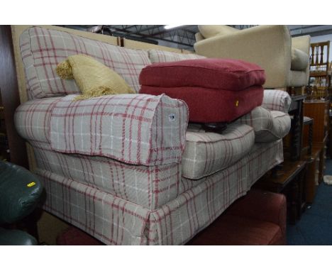A STRIPED SOFA, an armchair and a footstool (3)
