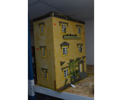 SCRATCH OR KIT BUILT WOODEN DOLLS HOUSE, modelled as a three storey town house, rear access to seven rooms, wired for electri
