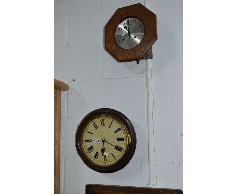 AN OAK CIRCULAR WALL CLOCK, and another wall clock (2) (winding key and two pendulums)