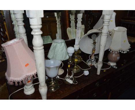 EIGHT TABLE LAMPS, including a converted brass parafin lamp 