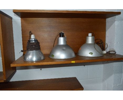 THREE SMALL INDUSTRIAL LIGHT FITTINGS, two fittings stamped Envoy 25cm diameter, the other 17cm diameter
