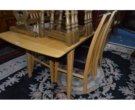 A MODERN LIGHT OAK EXTENDING DINING TABLE, with one additional leaf, approximate extended size width 171cm x depth 81cm x hei