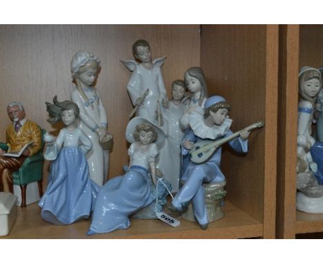 SIX NAO FIGURES/GROUP, reclining girl with bird, strumming Pierrot No 1078, girl with Dove, girl with hands on chest, a pair 