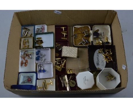 A BOX OF MIXED CUFFLINKS