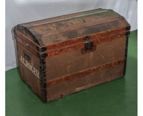 A domed top metal bound wooden travel trunk 82cm x 50cm
