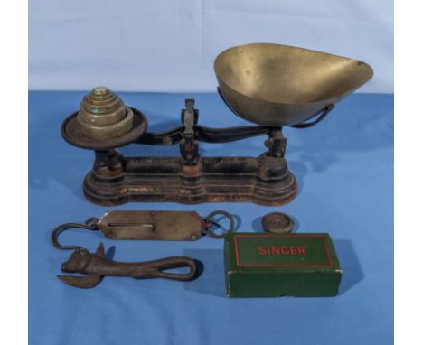 A pair of vintage weigh scales, can opener, spring balance scale and Singer sewing machine parts