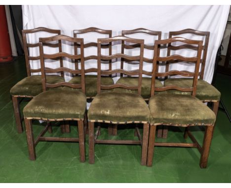 Six 1930’s oak ladder back style dining chairs