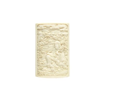 An ivory three-case inroBy Adachi Masanobu (born 1838), 19th centuryThe vertical rectangular body carved in relief with  Kiku