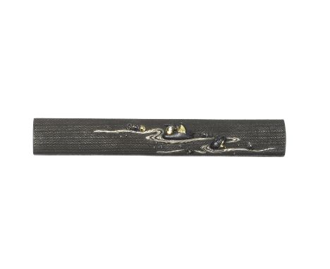 A dark shibuichi kozukaYanagawa School, 19th centuryThe nanako ground inlaid in gold, silver and shakudo takazogan with oshid