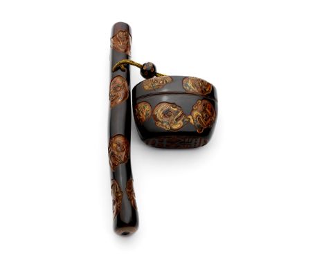 A guri-lacquer kiseruzutsu and tonkotsu (tobacco box)By Mutsumine Senshi, late 19th centuryThe pipe case of senryu-zutsu form