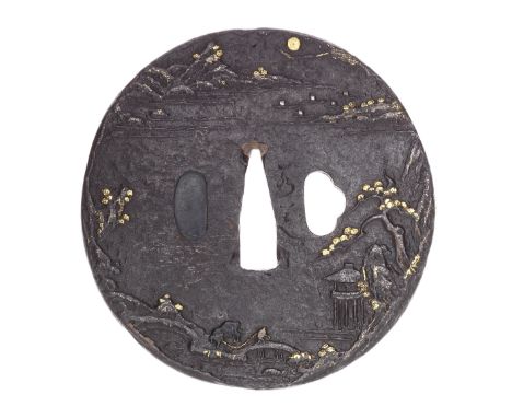 Two large iron tsubaJakushi school, Tosho type, 17th to 18th centuryThe first of circular form, carved with a lake scene with