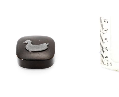 A black-lacquer hako netsukeBy Kiyokawa (Seisen), 19th centuryThe rounded rectangular form with a roiro ground inlaid in pewt