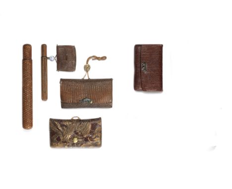 Three leather tabako-ire (tobacco pouches) and two kiseruzutsuThe miniature kiseruzutsu by Issai, 19th centuryThe first of le