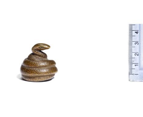 A boxwood netsuke of a snakeBy Sari, early 19th centuryTightly coiled in several loops, its head standing proud at the top an