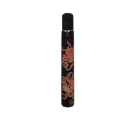 A lacquer kiseruzutsuBy Kano Tessai, (1845-1925), Meiji PeriodOf muso-zutsu type, bearing a roiro ground, carved in shishiaib