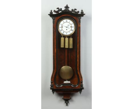 A 19th century walnut cased eight day triple weight Vienna wall clock by Gustav Becker. With ebonized mouldings, enamel dial 