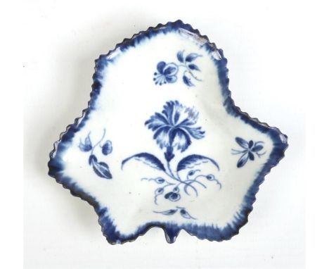 A Worcester leaf moulded pickle dish with serrated rim. Painted in underglaze blue with the Gillyflower pattern. Open crescen