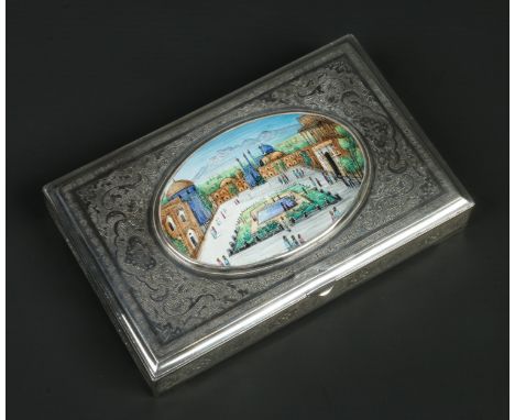 A Persian silver rectangular cigarette box. Engraved with scroll work and with and oval enamel plaque to the hinged cover dep