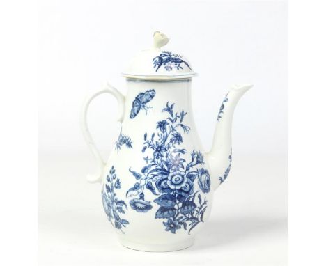 A Worcester baluster shaped coffee pot with domed cover and flower moulded finial. Printed in underglaze blue with the Three 