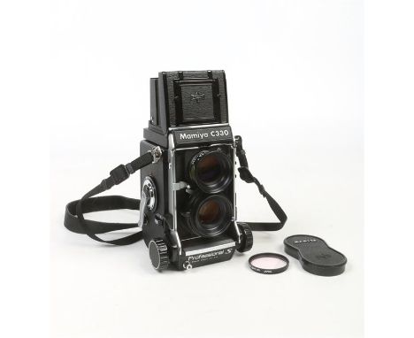 A Mamiya C330 Professional S TLR medium format camera, and Sekor S 80mm lens. With lens cover and skylight filter.Condition r