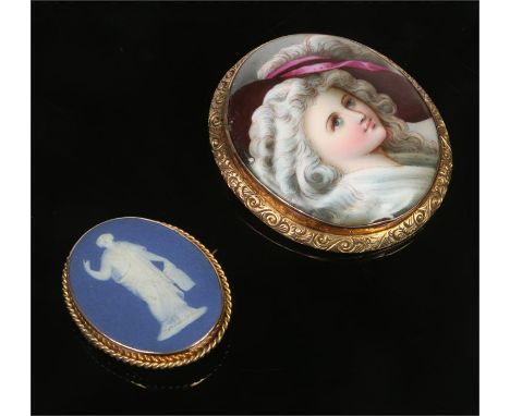 A 9 carat gold mounted porcelain brooch painted with the portrait of a lady along with another 9 carat gold mounted brooch se