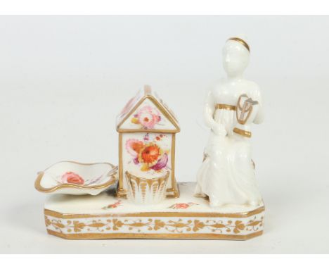 A Grainger Lee &amp; Co. Worcester figural desk stand. Surmounted by a seated maiden playing a lyre. Painted in coloured enam