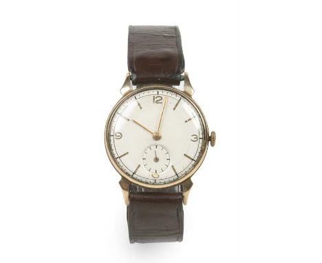 A gentleman's Smiths 9 carat gold manual wristwatch. With satin dial and having subsidiary seconds, 30mm wide.&nbsp;Condition