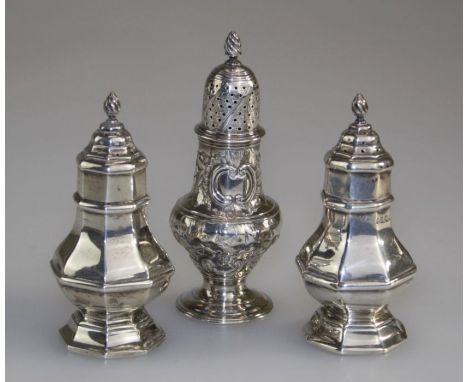 Charles Stuart Harris, a silver pepper of octagonal form, with flame finial on a spreading foot, London 1890, 11cm, together 