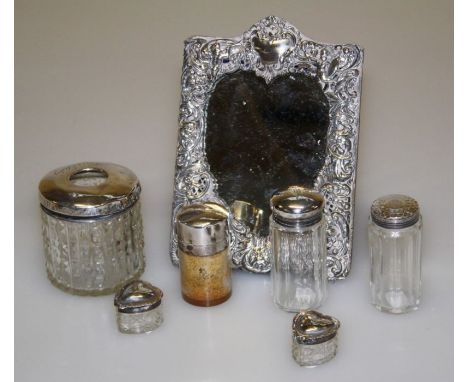 William Comyns and Sons Ltd, a late 19th century silver mounted easel dressing table mirror with heart shape plate, 20 x 13.5