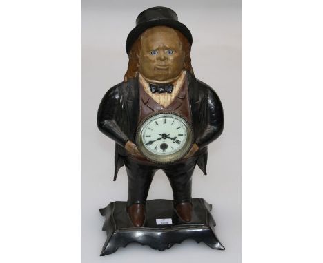 A Bradley and Hubbard cast iron cased ' blinking eye' mantle clock, modelled as John Bull, 39cm high