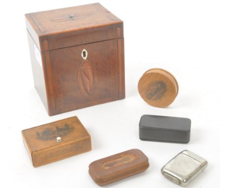 A Georgian mahogany tea caddy of simple rectangular form, featuring inlaid conch shell with string and banding decoration. To