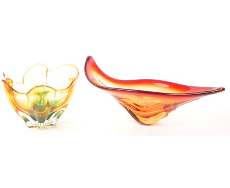 Two 20th century Italian and Czech studio glass centrepiece bowls. The first having handkerchief type edge in amber and green