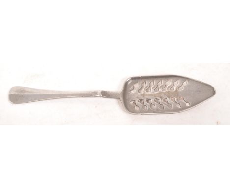 A late 19th century French white metal absinthe spoon. The spoon having a pierced basin with a handle in the Prescott pattern