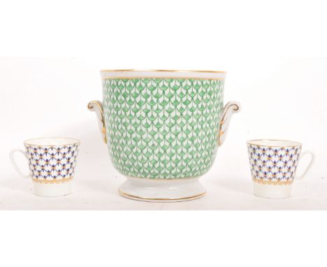 Lomonosov - A pair of late 20th century Lomonosov coffee / espresso cups, alongside a small planter. The cups each having whi
