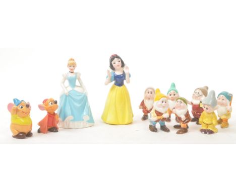 Disney - 20th Century - A collection of ceramic, hand painted Disney figurines in the form of Cinderella and her mice Gus and