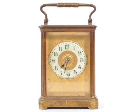 Reynoldson - A 19th century French Reynoldson brass carriage clock. The carriage clock having enamelled face with black roman