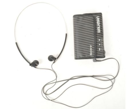 Sony Walkman - A 20th century portable mobile stereo cassette player. Model number WM - 40. With carry case, auto reverse fun