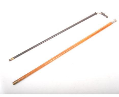 Two 20th Century vintage silver plated topped walking sticks. One having an ebonised cane with hook to top and mounted silver