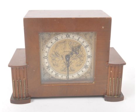 Rotherham - A vintage 20th century mid century circa 1940s Art Deco mantel clock. Having a foliate gilt face, ebonised roman 