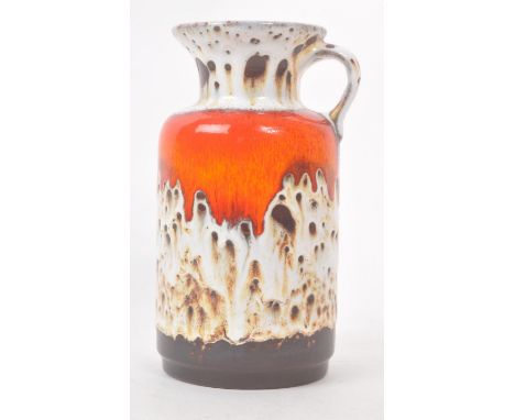 West German - A retro mid century ceramic pottery fat larva jug / vase. Flared circular rim with handle circular base with mo