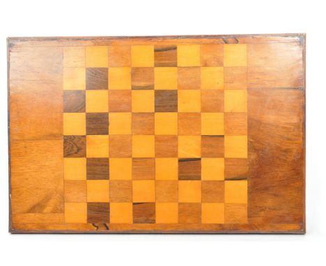 A large vintage 20th century chessboard. The chessboard having inlaid top with Celtic knot decoration to the edge. Overturnin