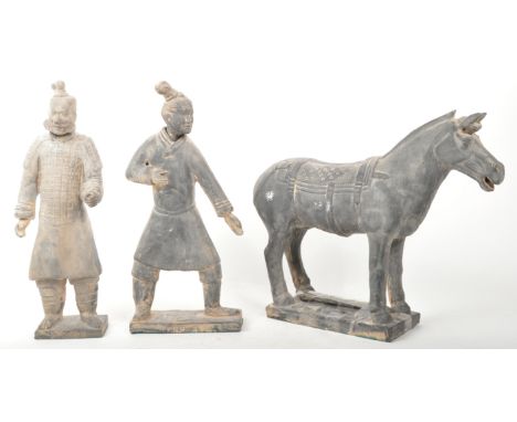 A collection of three Chinese 'Terracotta Army' manner terracotta ceramic figures. The collection to include to male warrior 