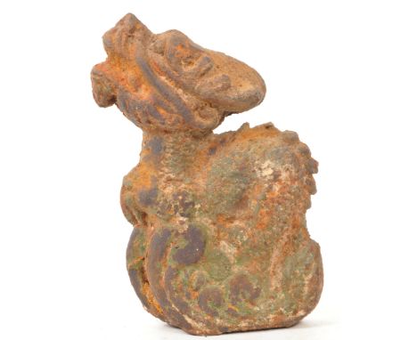 A 20th century Chinese cast metal architectural dragon sculpture figure. The figure in the form of dragon, raised on cast clo