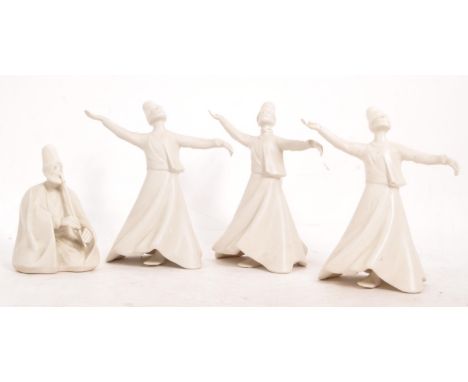 A collection of four Yildiz porcelain ceramic sufi dancer figures. The collection consisting of four figures, three posed wit