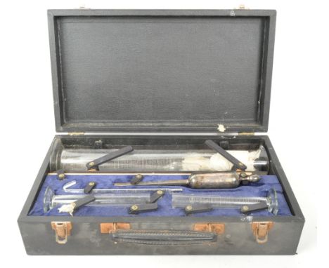 A vintage 20th century scientific measuring cylinders / equipment. Made in England branded Dewarex largest measuring cylinder