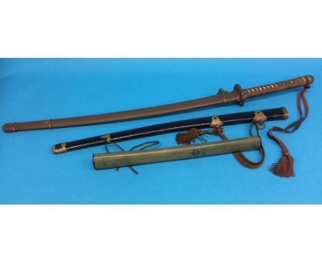 An Imperial Japanese army sword, no blade with blue-brown sword knot and two other scabbards and a brown sword knot