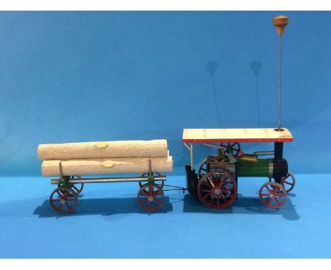 A boxed Mamod steam tractor and lumber wagon